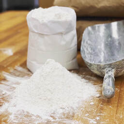 A pile of flour on a table.
